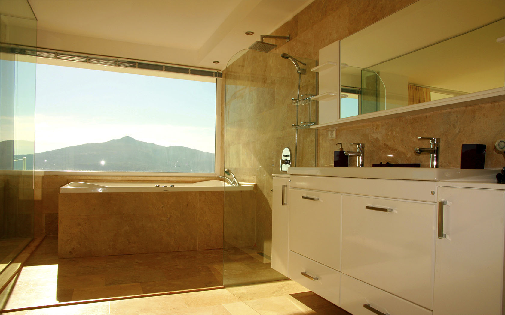 Spa-style bathroom with panoramic view.