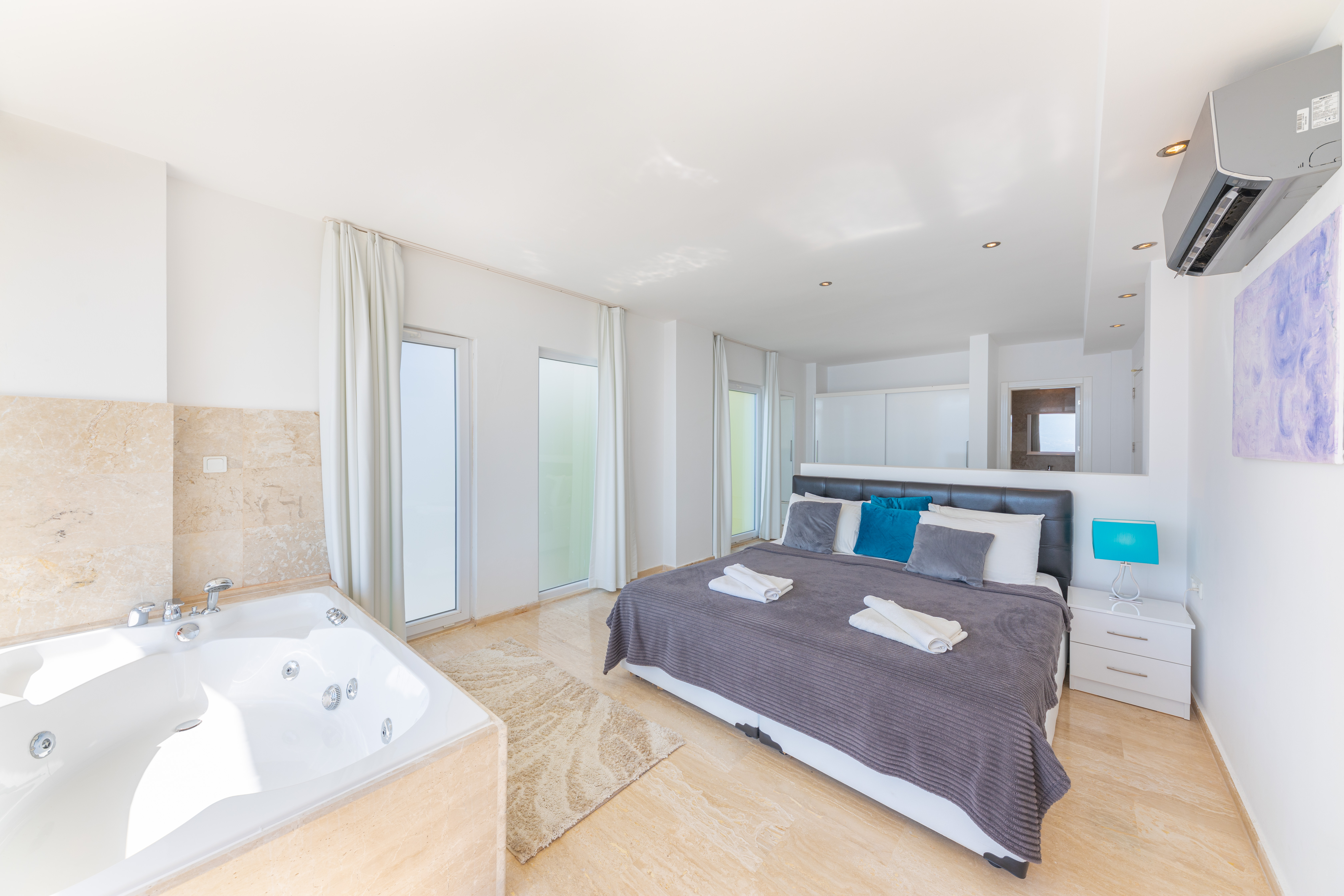 Master bedroom 2 with a calm, elegant finish.